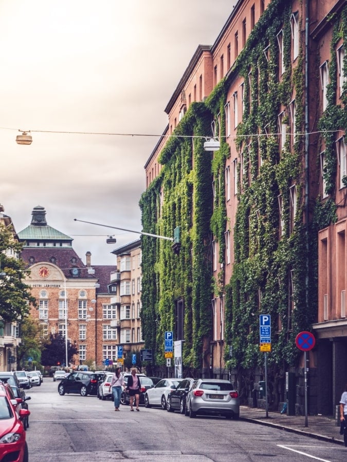 Ivy covered buildings on a street in stockholm, sweden.