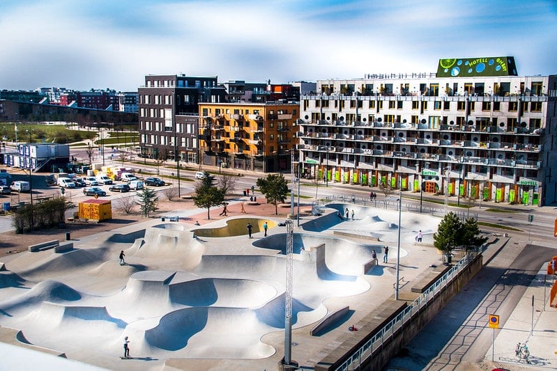 A skateboard park in the middle of a city.