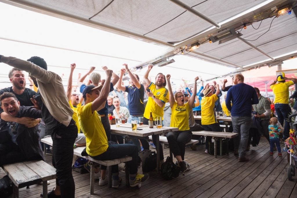 swedish soccer fans watching sweden beat switzerland in a world cup game