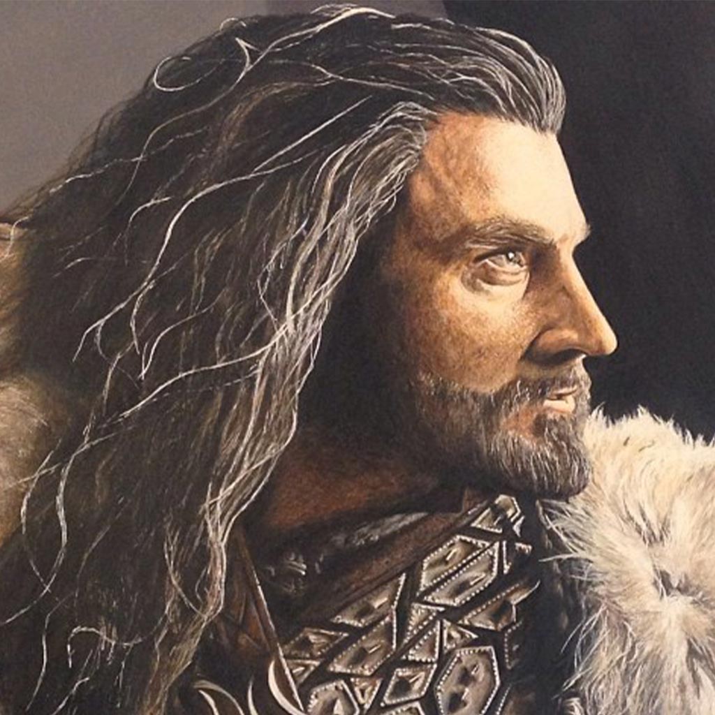 A portrait of a man with long, flowing hair and a beard, gazing to the side. He wears intricate armor and a fur cloak reminiscent of medieval Denmark. The background is dark, and the detailed artwork highlights his intense expression and Scandinavian attire.