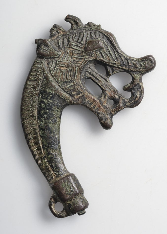 dragon head dress pin gotland sweden photo by historiska